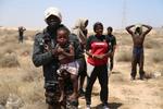 Afrikanske migranter på grænsen mellem Libyen og Tunesien. Arkivfoto.  Foto: Yousef Murad/Ritzau Scanpix