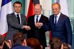 Macron, Scholz og Tusk lover fortsat støtte til Ukraine. Foto: Odd Andersen/Ritzau Scanpix