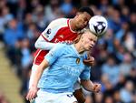 Arsenal's Gabriel Magalhaes og Citys Erling Haaland havde mange dueller i topkampen. Foto: Carl Recine/Ritzau Scanpix