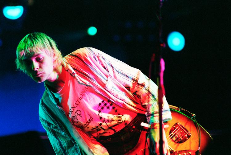 Nirvanas album 'Nevermind' danner ramme om portrættet af podcastvært Anne Kirstine Cramon i Radio 4-programmet 'Portrætalbum'. Her ses forsanger og guitarist Kurt Cobain på Roskilde Festival i 1992. Foto: Tine Harden