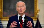 Joe Biden taler til pressen, efter at han har underskrevet våbenpakken. Foto: Jim Watson/Ritzau Scanpix