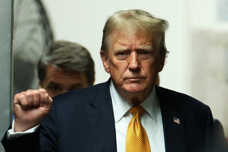 Påstanden om, at Donald Trump var blevet snydt ved præsidentvalget i 2020, blev gentaget så mange gange, også i medierne, at den blev troet af en stor del af den amerikanske befolkning. Foto: Charly Triballeau/Pool/AFP/Ritzau Scanpix