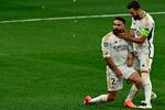 En af banens mindste spillere, Dani Carvajal, scorede et flot hovedstødmål, som blev fejret med holdkammeraten Nacho Fernandez. Foto: Ben Stansall/Ritzau Scanpix
