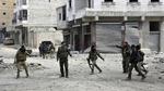 Syriske styrker patruljerer et område i Aleppo 