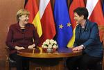 Tysklands forbundskansler Angela Merkel (t.v.) og den polske ministerpræsident Beata Szydło kom ordentligt på talefod under den tyske regeringschefs besøg i det østlige naboland. 