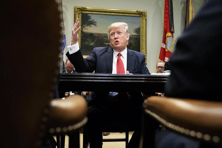 Donald Trump vil tage sine forretningsmandsmetoder med ind i Det Hvide Hus og lave personlige deals med verdens ledere. Arkivfoto: Evan Vucci