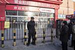 Kina har lukket en stor del af supermarkedskæden Lottes butikker i landet, heriblandt denne i Beijing. 