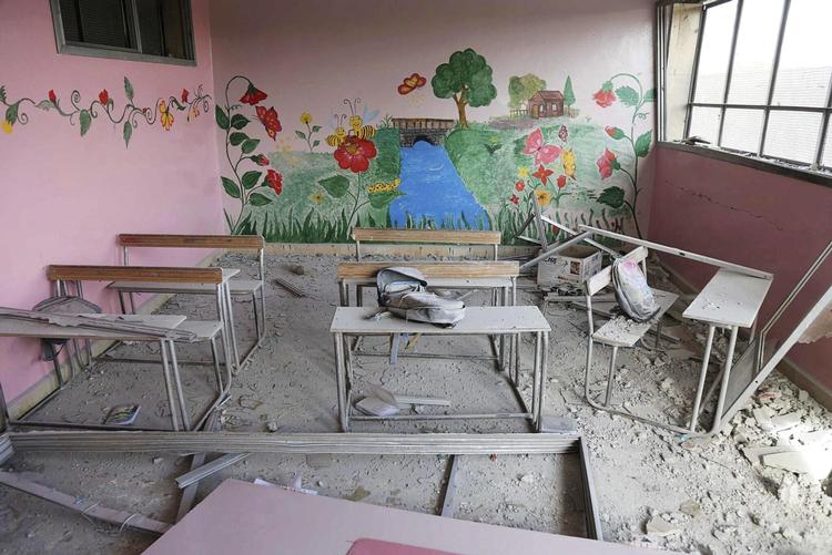 Bombninger som af denne skole i hovedstaden Damaskus kostede mindst 652 børn i Syrien livet i 2016. 
