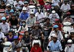Den sortlistede danske virksomhed hjælper med at forbedre trafiksikkerheden, blandt andet i Hanoi. Foto: AP 