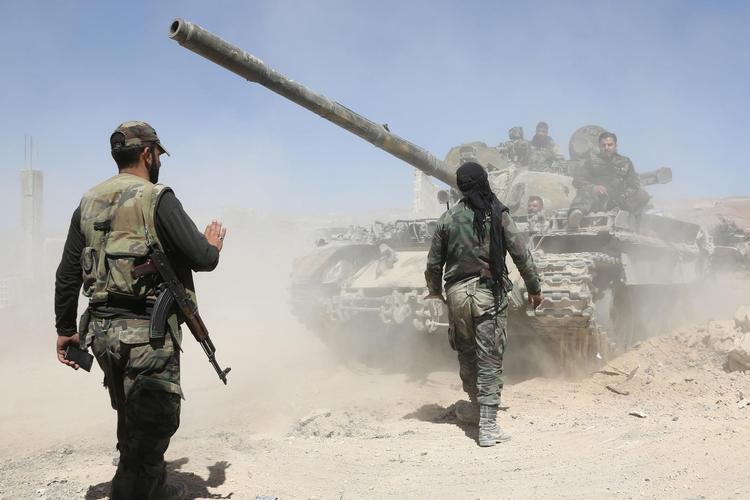 Bashar al-Assads styrker er i fuld gang med at indtage området Douma i Østghouta. I den syv år lange borgerkrig har det syriske diktatur undervejs fået militær støtte fra Rusland, Iran og den libanesiske Hizbollah-bevægelse. AFP