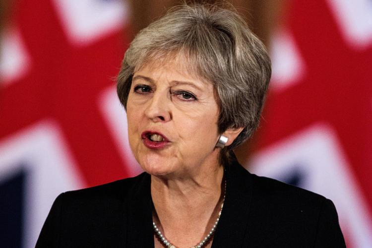Theresa May talte i går til nationen, efter at hun var vendt hjem  fra et EU-topmøde, hvor der ikke var  støtte til hendes brexitplaner. Samtidig er hun presset af kritik i bagland. Jack Taylor/Ritzau Scanpix