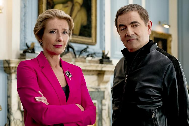 Rowan Atkinson som Johnny English (th) og Emma Thompson som premierminister (tv). UPI Media