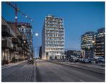 Frihavnstårnets lette altanfacade står i modsætning til tyngden i omgivelserne, men står også i kontrast til den havnekarakter og ombyggede silo, den er. Foto: Jens Lindhe 