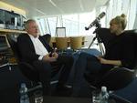 Lars Seier Christensen og vært Marie Høst i udsendelsen ’Den rigeste procent’. 