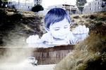 APTOPIX US-Mexico-Peering Toddler-Border Wall