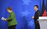 Forbundskansler Angela Merkel brugte ikke mange  sekunder på præsident Emmanuel  Macrons yndlingsidé om en særskat. Geert Vanden Wijngaert/AP/AP