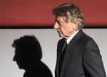 Da USA bankede på, afleverede alpelandet Schweiz hellere filmmanden end deres bankhemmeligheder. Michael Probst/AP
