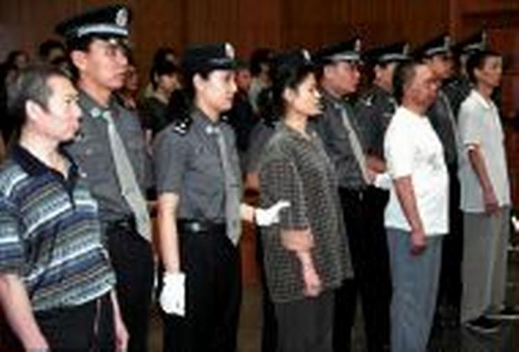 Den øverste folkedomstol i Beijing fandt de fire skyldige i mord. Foto: AP 