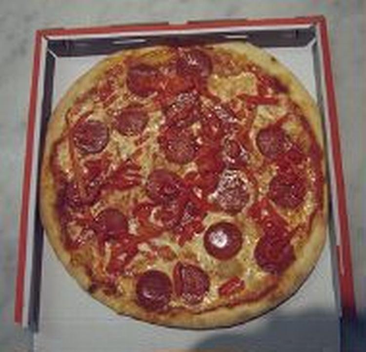 Eksperterne tror ikke danskerne vil droppe pizzaerne. - Foto: Thomas Borberg 