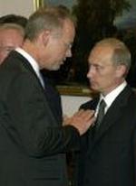 Ruslands præsident Putin i samtale med den tyske forsvarsminister Scharping. - Foto: AP 