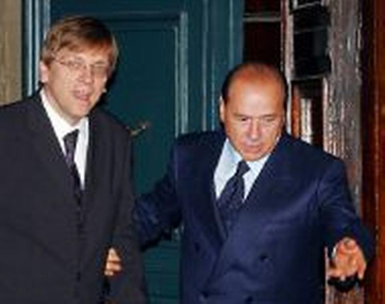 Berlusconi til møde med den belgiske statsminister Guy Verhofstadt. - Foto: AP 