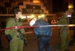 Israels politi afspærrede området efter selvmordsaktionen. - Foto: AP 