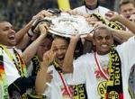 Borussia Dortmunds spillere fejrer lørdagens sejr. - Foto: AP 