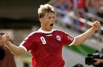 Med fire mål under VM har Jon Dahl Tomasson skudt Danmark frem på verdensranglisten. Foto: AP 