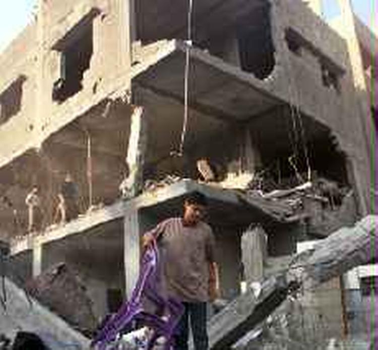 Ødelæggelser efter angrebet i Gaza By. - Foto: AP 