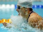 Ukraines Oleg Lisogor satte ved EM i Berlin med en tid på 27,18 sekunder en imponerende verdensrekord på 50 meter brystsvømning. - Foto: AP 