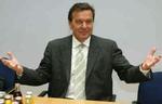 Gerhard Schröder kan blive siddende som kansler - på et hængende hår. - Foto: AP 