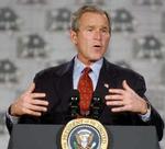 »Vi vil om nødvendigt udkæmpe en krig på to fronter«, siger præsident Bush, der ikke vil tillade, at fokus fjernes fra Irak og Saddam Hussein. - Foto: AP 