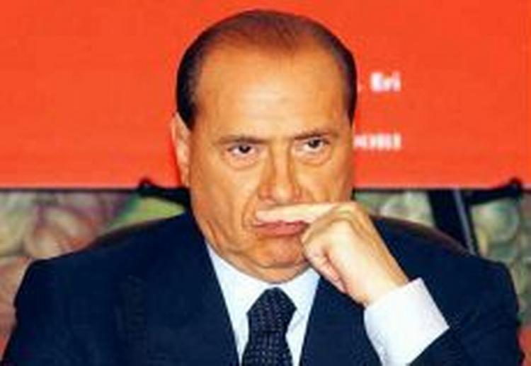 »Vores skolebørn skal ikke længere studere skolebøger præget af marxistisk afvigelse«, sagde Berlusconi for to år siden, og nu ønsker hans venner i parlamentet at skride til handling. - Foto: AP 