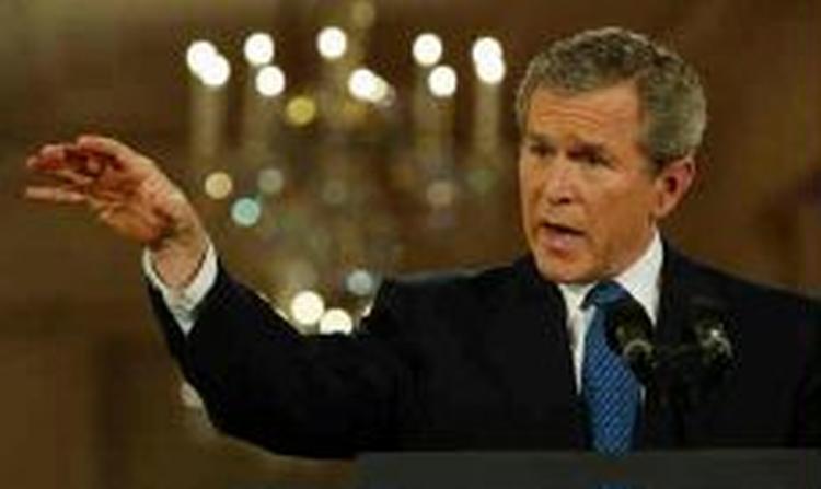 På spørgsmålet om, hvornår krigen kommer, siger Bush, at 'vi er ved det sidste diplomatiske forsøg'. - Foto: AP 