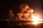 Tyk røg over Bagdad efter aftenens bombeangreb. - Foto: AP 