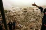 Sådan så der ud i Mansur efter, at USA angiveligt forsøgte at få ram på Saddam Hussein mandag formiddag. Mindst syv civile blev dræbt. - Foto: AP 