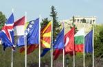 Nogle af flagene fra de ti lande, der ønsker at træde ind i EU. - Foto: AP 