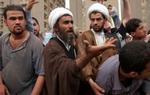 Vrede shi'iter har mandag demonstreret imod USA i Bagdads gader. - Foto: AP 