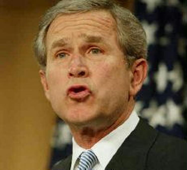 Bush føler moralsk ansvar for aids-ramte i Afrika og Caribien. - Foto: AP 