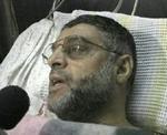 Hamas-leder Abdel Aziz Rantisi blev lettere såret under dagens første israelske helikopterangreb. Han har fra sin sygeseng erklæret, at den hellige krig fortsætter. - Foto: AP 