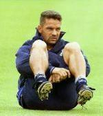 Italian player Roberto Baggio stretches during a 