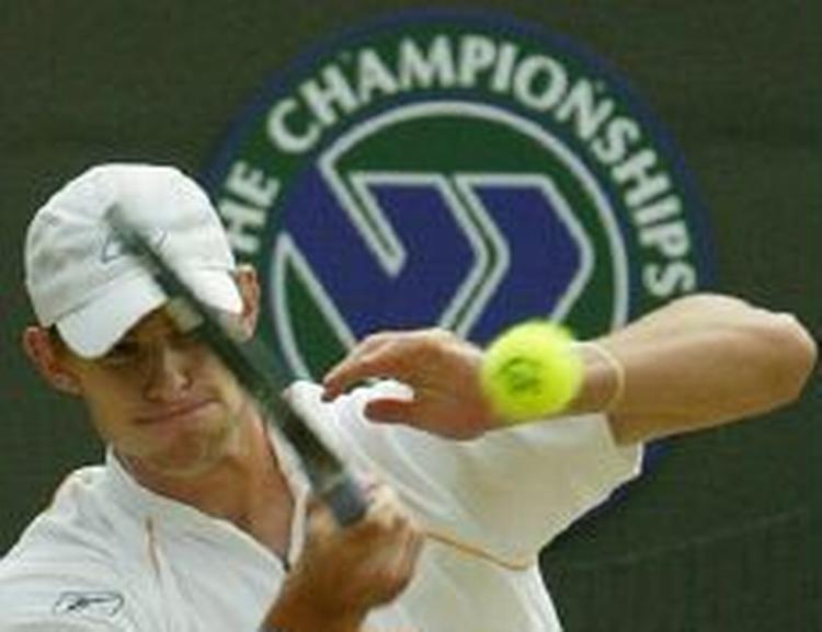 Andy Roddick sendte Jonas Björkman ud med maner. - Foto: AP. 