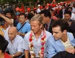 Beckham omgivet af fans i Kunming. - Foto: AP 