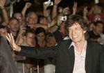 Mick Jagger ankommer til festen. - Foto: AP. 