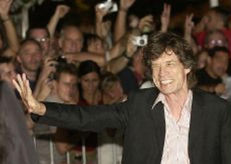 Mick Jagger ankommer til festen. - Foto: AP. 