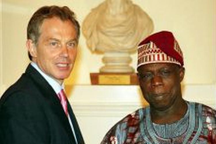 Den nigerianske præsident Olusegun Obasanjo siger, at han vil kunne sende tropper ind i Liberia i løbet af få dage. - Foto: AP 