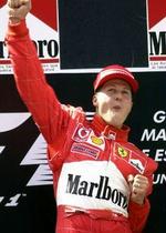Tobaksreklamer - som denne på Michael Schumachers dragt - er ikke tilladte i Canada. Derfor aflyser Formel 1-branchen næste års Grand Prix i Montreal. - Foto: AP 