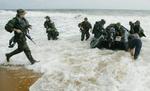 De amerikanske specialstyrker, der gik i land i Liberia mandag er klar til at blive afløst inden den 1. oktober. - Foto: AP 