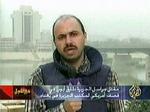 En journalist fra Al-Jazeera rapporterer fra Bagdad. - Foto: AP 
