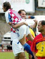 Kroatiske Niko Kovac med nummer ti fejrer sin scoring. - Foto: AP 